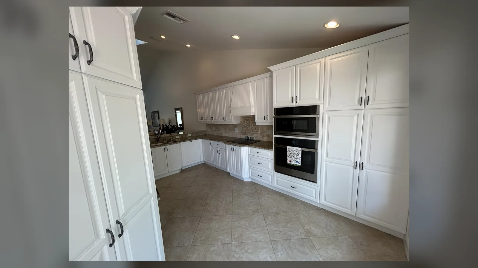 White kitchen cabinets refinished in Naples