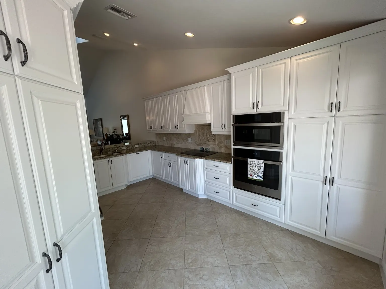 White kitchen cabinets refinished in Naples